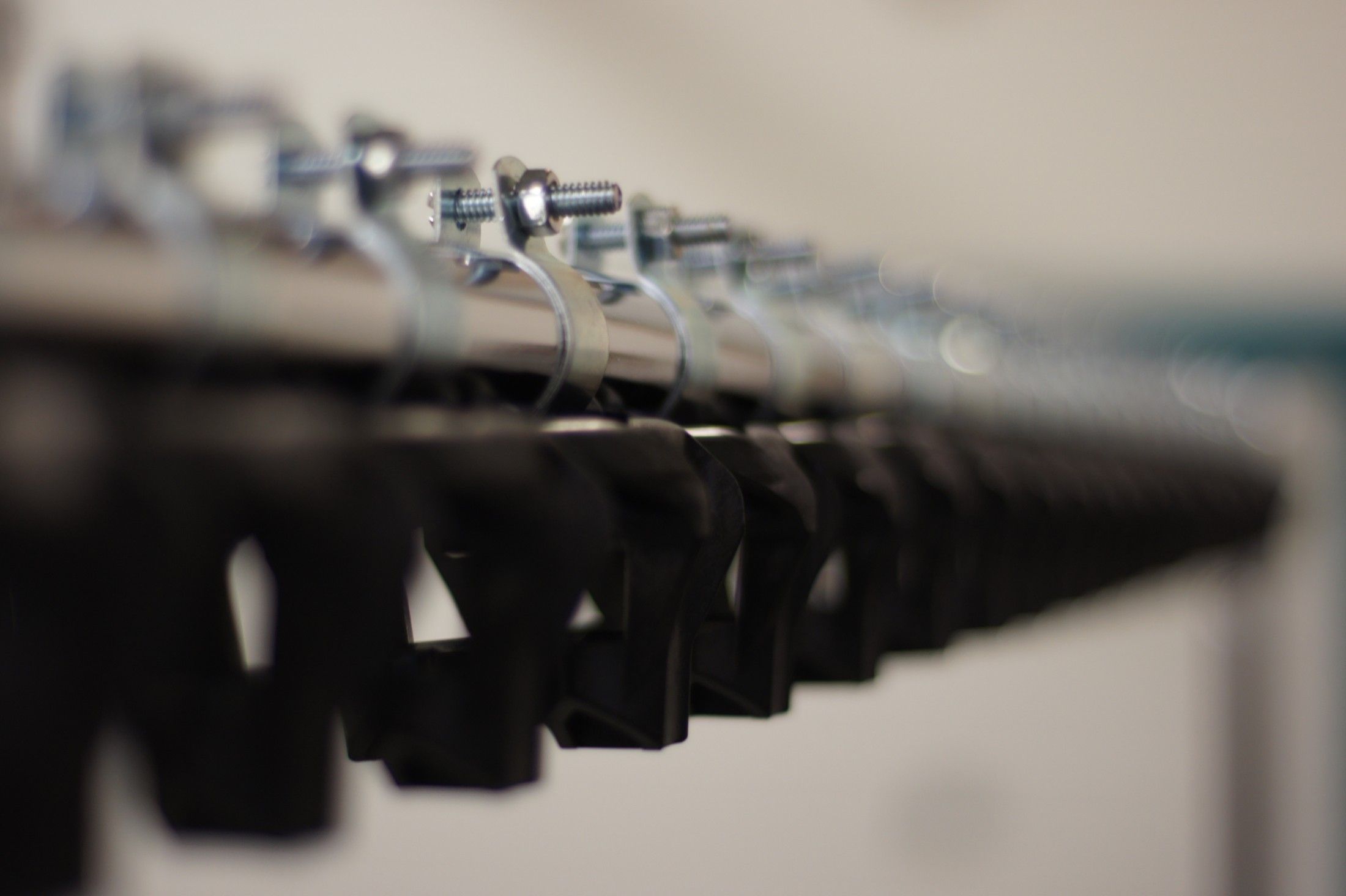 A row of identical molded parts ready for assembly