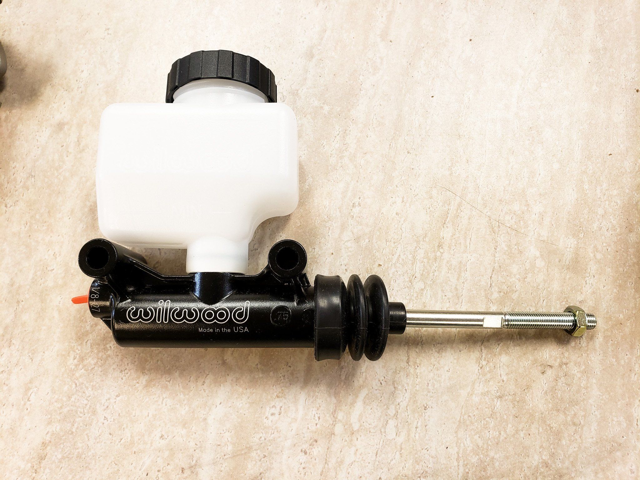 The Wilwood master cylinder with its fluid reservoir