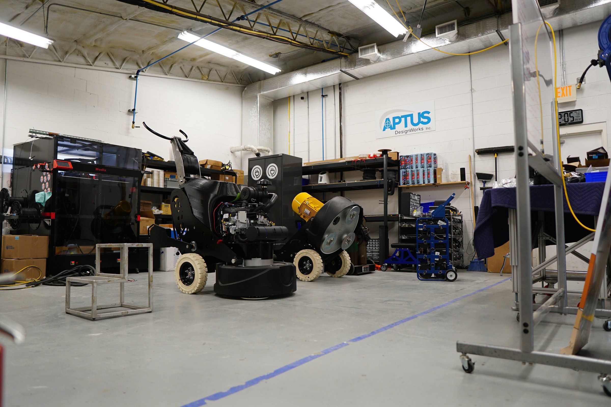 The APTUS DesignWorks shop floor in Alcoa, bright and open, with prototypes in progress