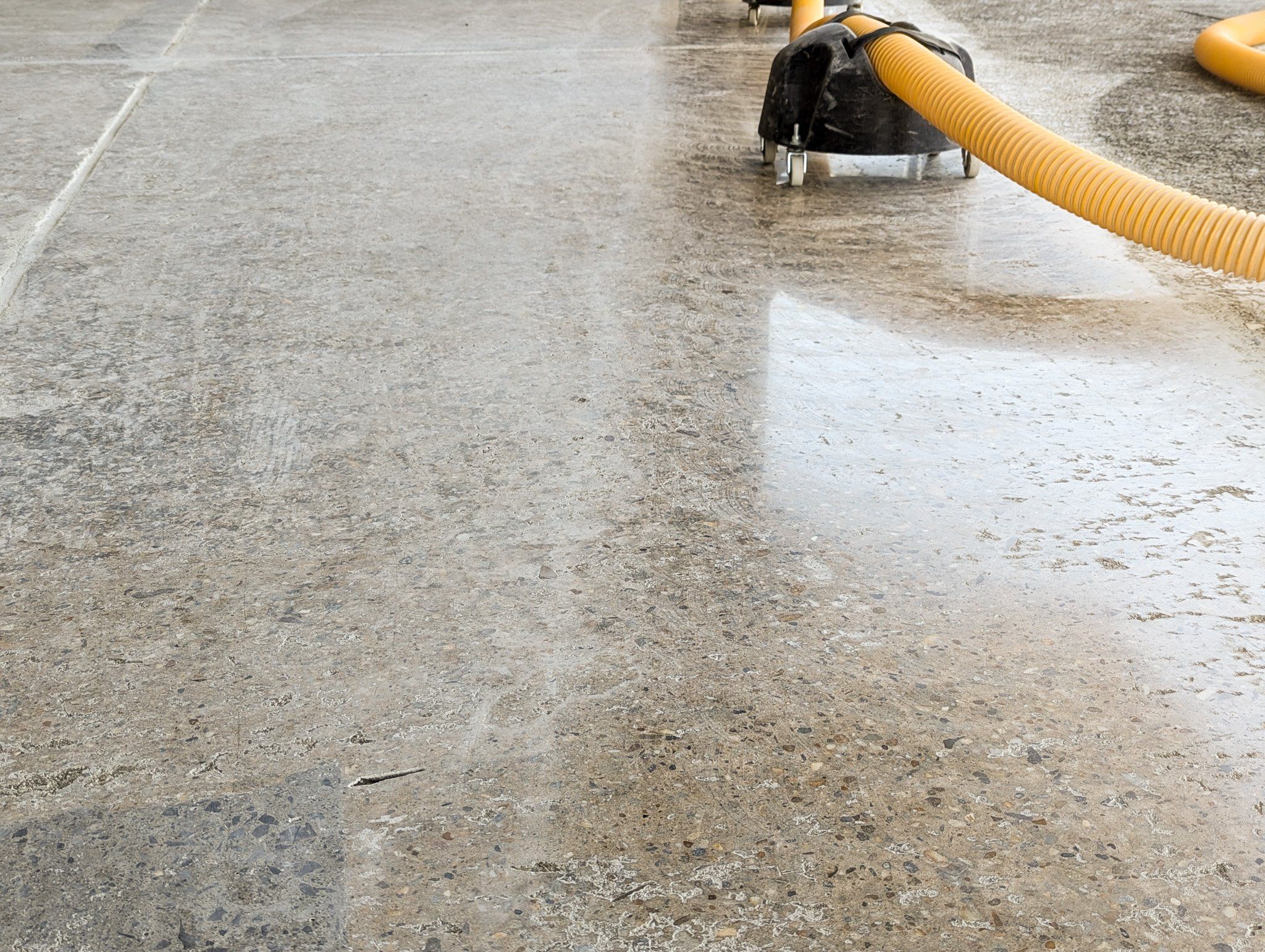 A freshly ground concrete floor with a glossy finish