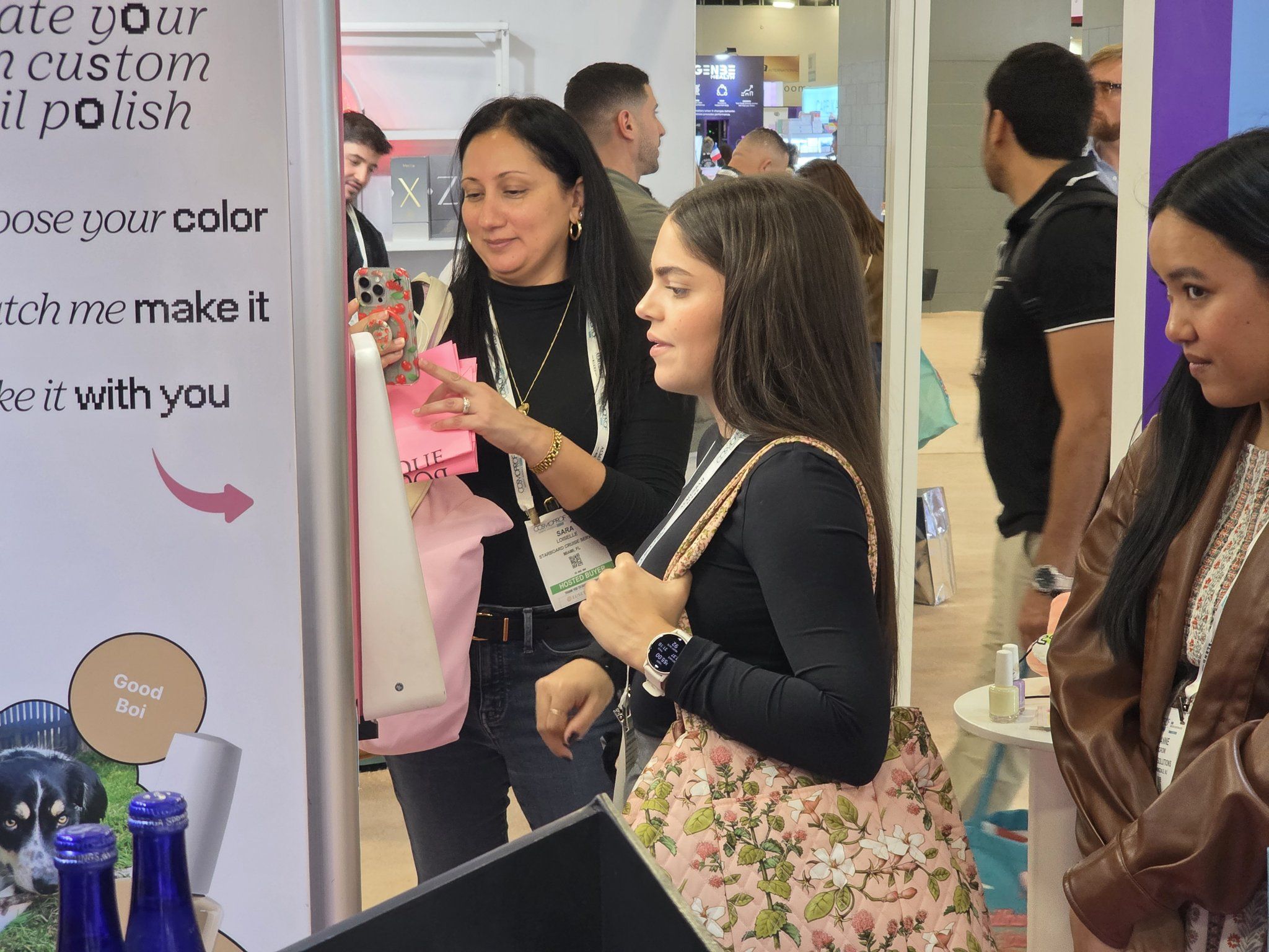 A customer choosing her custom shade with the Blank Beauty team at the show