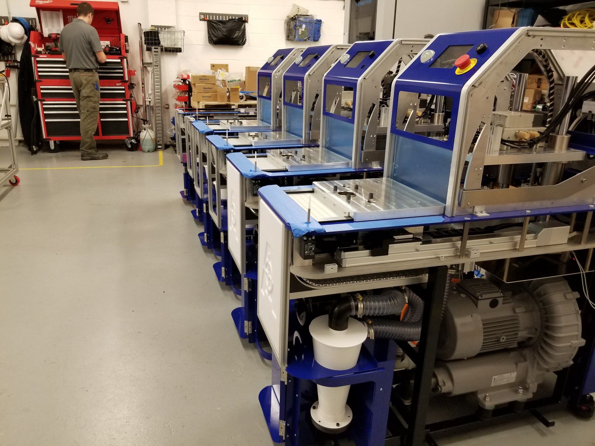 A row of identical production cells built in the APTUS shop