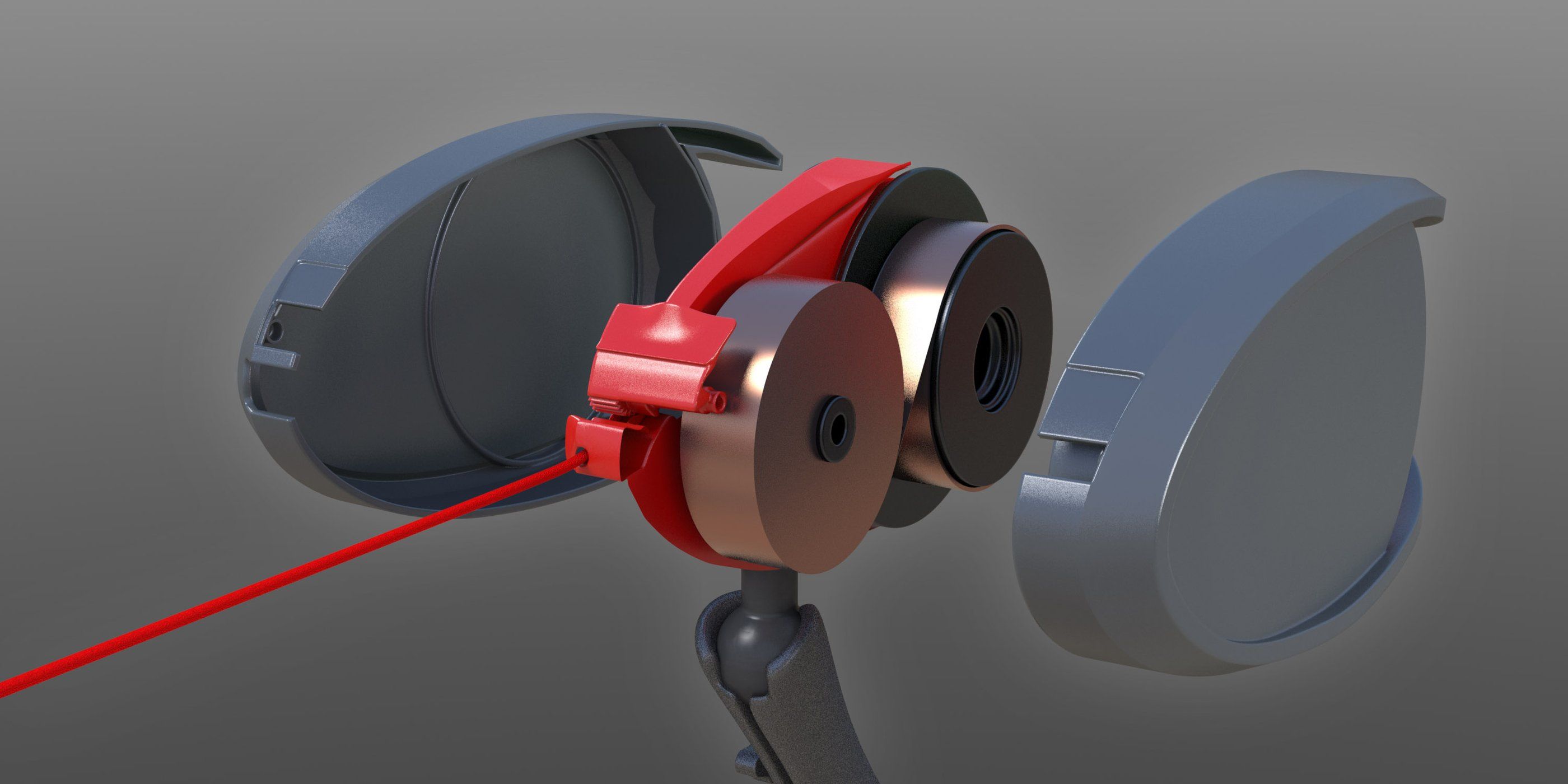 Exploded render showing the red reel inside the housing
